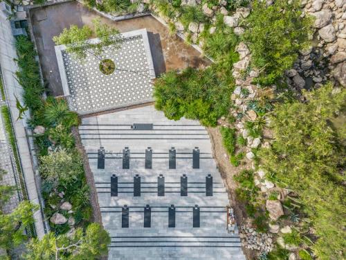 an overhead view of a road with trees and bushes at Live Aqua San Miguel de Allende in San Miguel de Allende
