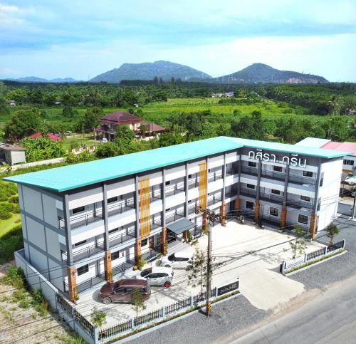 an overhead view of a building with a blue roof at Gasira Green in Ban Tha Kham