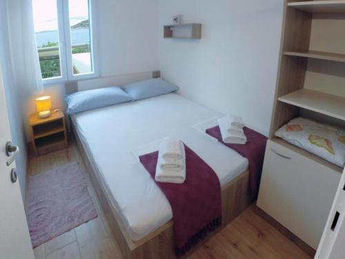 Katil atau katil-katil dalam bilik di Holiday Home Adriana