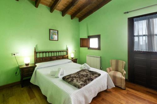 Кровать или кровати в номере Casa La Aldea de Guadamia