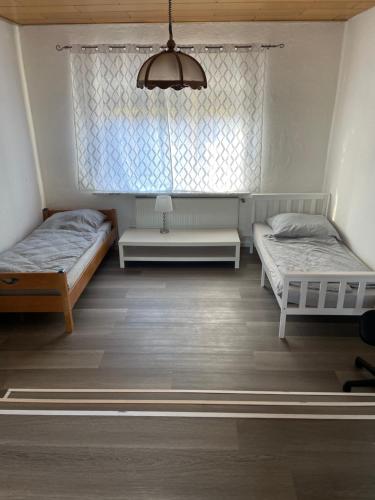 Posteľ alebo postele v izbe v ubytovaní Mikos Unterkunft