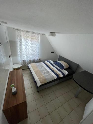 Una cama o camas en una habitación de Mikos Unterkunft