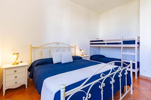 A bed or beds in a room at Appartamento Levante Luxury - MyHo Casa