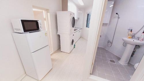 Ένα μπάνιο στο Woodland Apartment - For foreigners only
