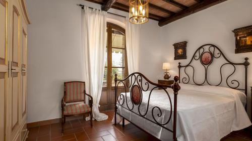 Postel nebo postele na pokoji v ubytování VILLA BINETTI 7, Emma Villas