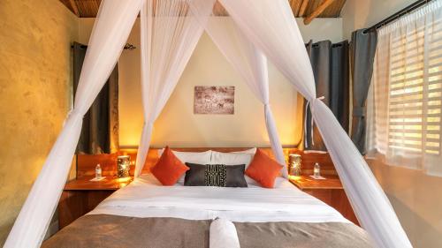 Cama o camas de una habitación en Sambiya River Lodge
