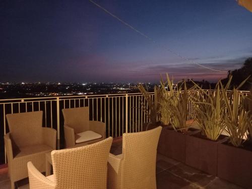 Balkón nebo terasa v ubytování TERRAZZA SAN VETTORE camere con colazione, Relax in collina con vista sui vigneti DOCG ASOLO