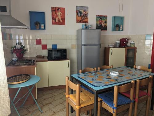 Kuchyňa alebo kuchynka v ubytovaní L'ermellino Ubriaco Casa vacanza