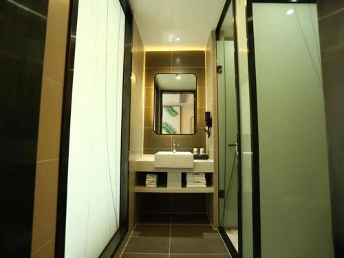 Ванная комната в Thank Inn Plus Suqian Sihong Hongze Lake Avenue