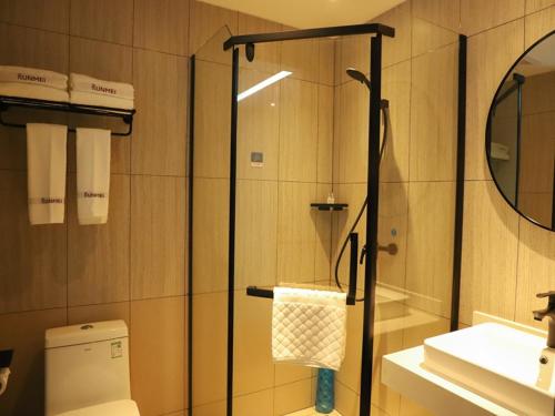 Bilik mandi di Thank Inn Plus Baotou Kundulun District University of Science and Technology