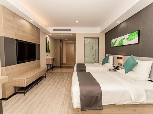 Säng eller sängar i ett rum på Thank Inn Plus Xuzhou Yunchuang Technology Park Ocean Polar World
