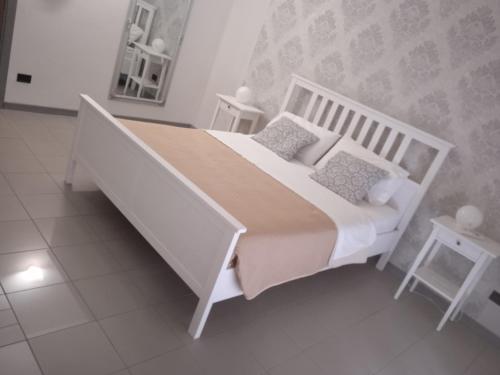 Katil atau katil-katil dalam bilik di Residenza Locatelli