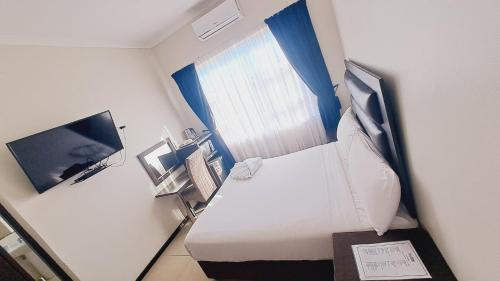TV o dispositivi per l'intrattenimento presso Bayside Hotel Empangeni