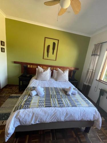 Postel nebo postele na pokoji v ubytování Marula Lodge