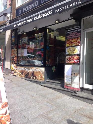 a store front of a bakery on a city street at Porto Chique AL 2 in Porto