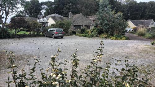 a car parked in a parking lot in a driveway at Inveraray Farm in Beaufort