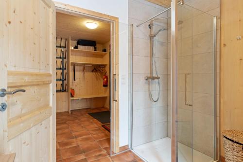 a bathroom with a shower and a walk in closet at Chalet in Hohentauern - Chalet Ana in Hohentauern