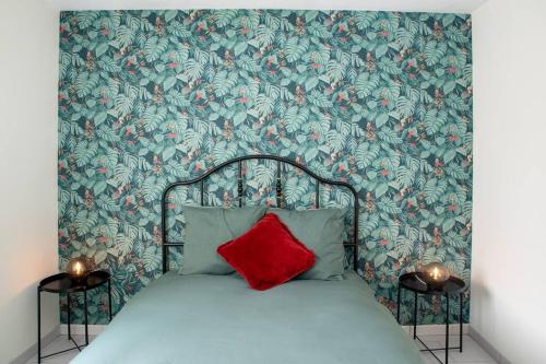 Llit o llits en una habitació de Djial - proche de CDG et du Parc Asterix
