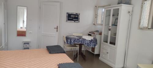 Postel nebo postele na pokoji v ubytování casa vacanze ALFONSINA