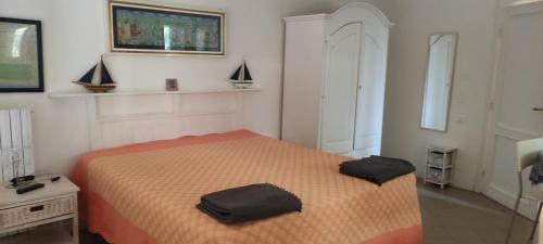 Postel nebo postele na pokoji v ubytování casa vacanze ALFONSINA