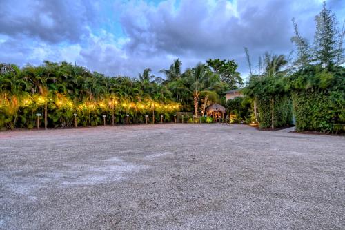 a driveway with a house and a bunch of lights at Siesta Key Palms Resort in Sarasota