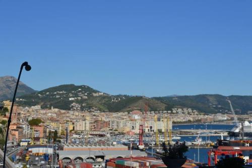 vista su una città con porto di B&B Charming House a Salerno
