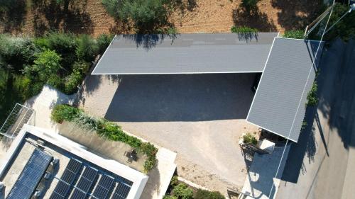 an overhead view of a building with a roof at Rifugio di Puglia - Trulli & Dimore in Alberobello