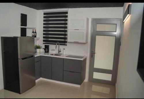 Η κουζίνα ή μικρή κουζίνα στο North Breeze Guest House 2