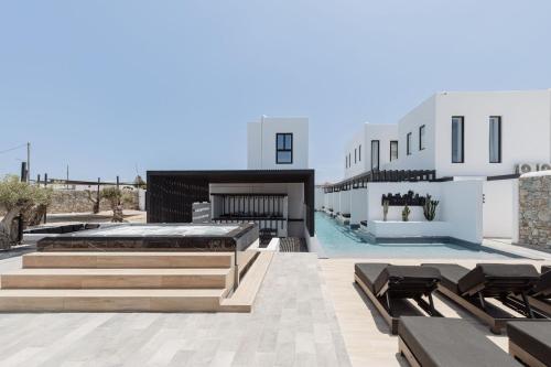 a view of a building with a swimming pool at Laguna Suites in Mazera Mykonos in Mýkonos City