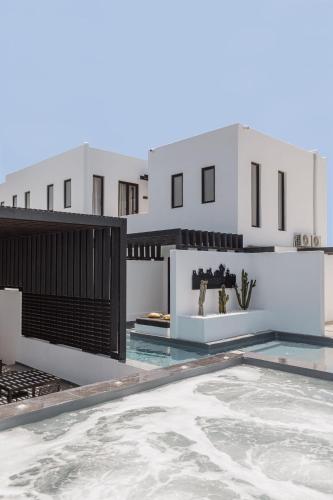 a view of a house with a swimming pool at Laguna Suites in Mazera Mykonos in Mýkonos City
