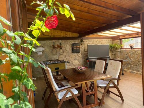 a wooden table and chairs in a kitchen at Saleros in Navarrete
