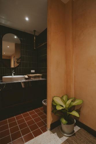 Ένα μπάνιο στο Hotel Clay Chiang Mai