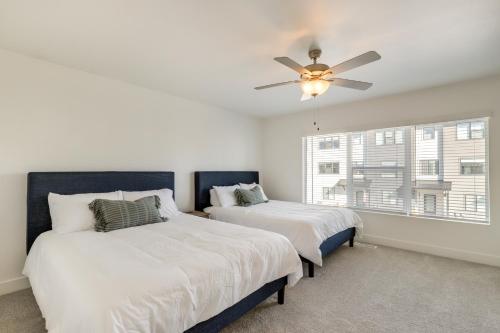 a bedroom with two beds and a ceiling fan at Inviting American Fork Home with Community Pool! in American Fork