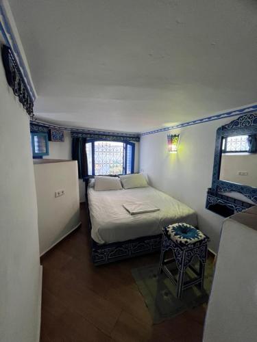 En eller flere senge i et værelse på Meftah’s house