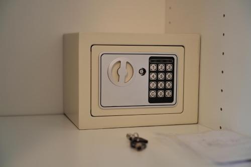 a microwave sitting on top of a counter at Thyke Apartment in Krapinske Toplice