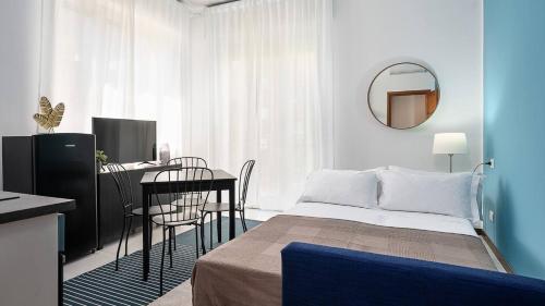 Ένα ή περισσότερα κρεβάτια σε δωμάτιο στο Blue City Paradise - Renovated APT in center Milan