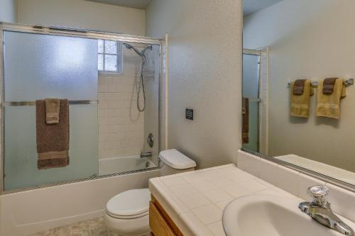 a bathroom with a sink and a toilet and a shower at Pet Friendly Mariposa Retreat with Spacious Patio! in Mariposa