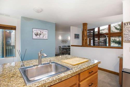 a kitchen with a sink and a counter top at Adventure awaits in cozy retreat between Vail and Beaver Creek in Vail