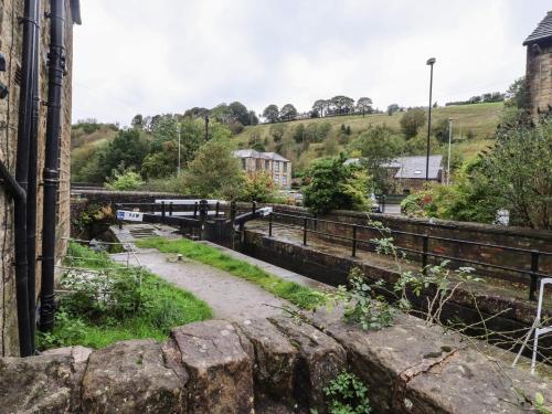 a view of a river from a building at 20 Wool Road in Oldham
