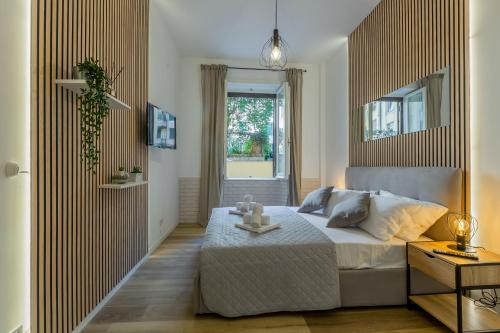 Imperium House - appartamento con giardino privato, 3 minuti da Metro Piazza Bologna, A-C,