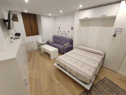 En eller flere senge i et værelse på Mirando al Huécar