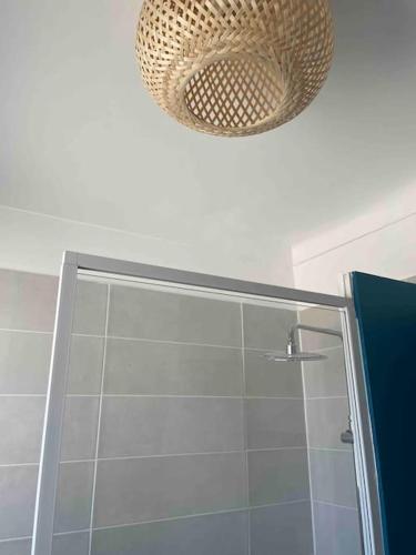 a bathroom with a shower and a ceiling at Torreilles-Casa terracota-plage - visa image- les déferlantes le Barcares - South of France in Torreilles