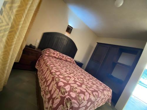 Postel nebo postele na pokoji v ubytování Hotel D´ Alba