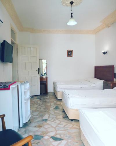 Katil atau katil-katil dalam bilik di Hotel Anadolu