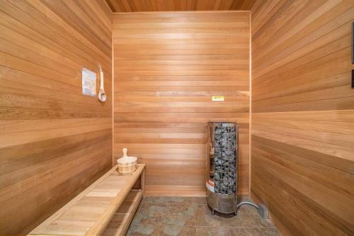 a sauna with wood paneled walls and wooden walls at Villa Luna in Gig Harbor