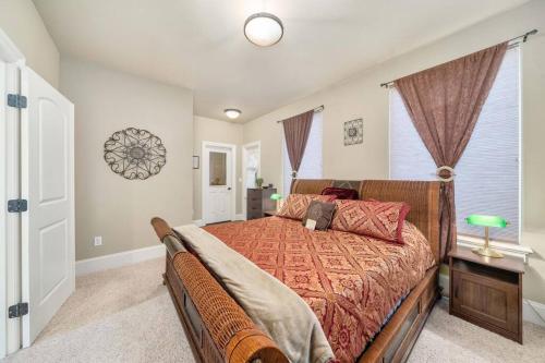 a bedroom with a large bed and a window at Villa Luna in Gig Harbor