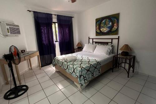 Postel nebo postele na pokoji v ubytování Cute and Convenient Apartment