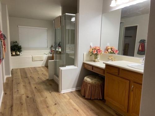 a bathroom with a shower and a sink at Luxury Wine Paradise 5Bd House-Murrieta CA in Murrieta