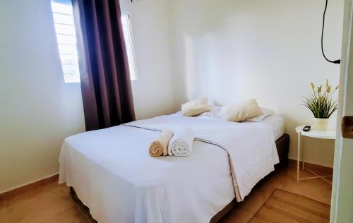 Dominican Dream Apartmentsにあるベッド