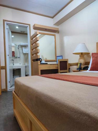 Η κουζίνα ή μικρή κουζίνα στο PHELA GRANDE HOTEL